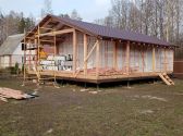 Каркасный дом с террасой и навесом