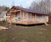 Каркасный дом с террасой и навесом