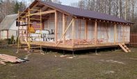 Каркасный дом с террасой и навесом